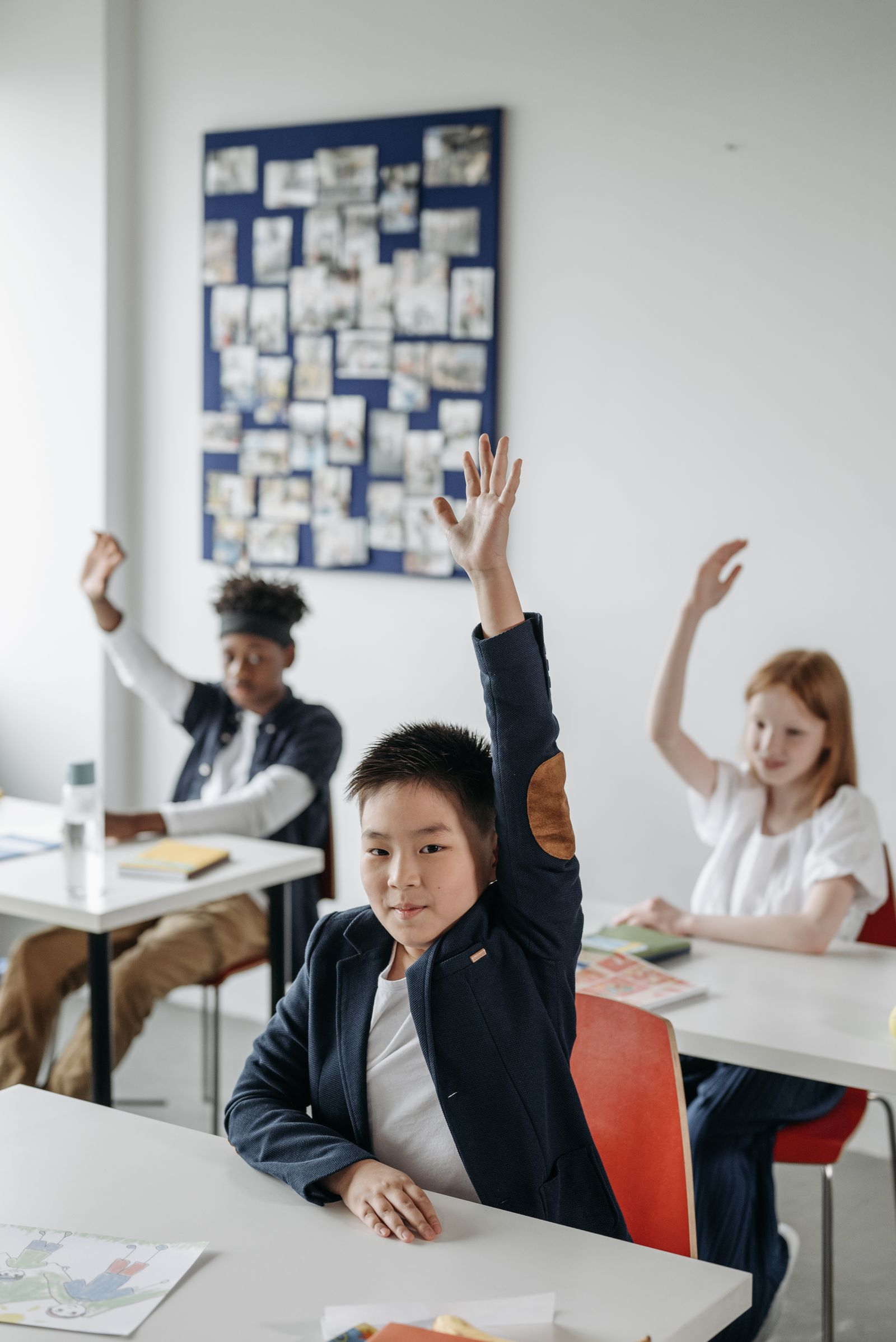 A small group of children working with an adult
